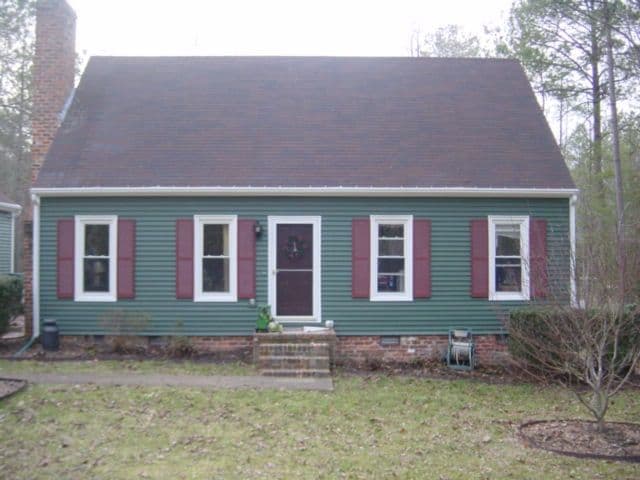 Charming Home Makeover with Vinyl Siding and Windows image