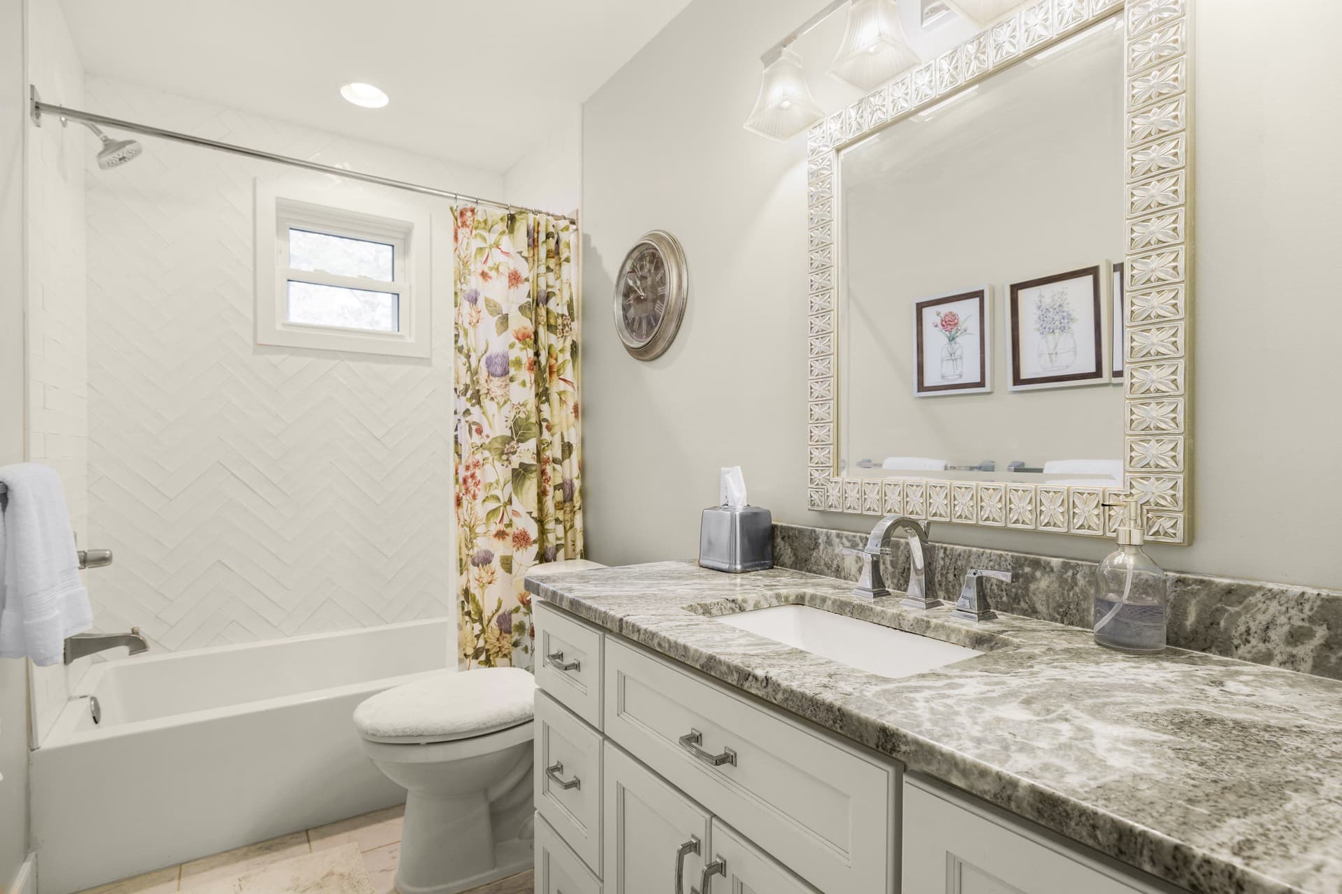 Elegant Bathroom Transformation with Herringbone Tile image